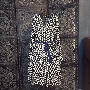 cute polkadot dress with a nice tie around it and in great condition